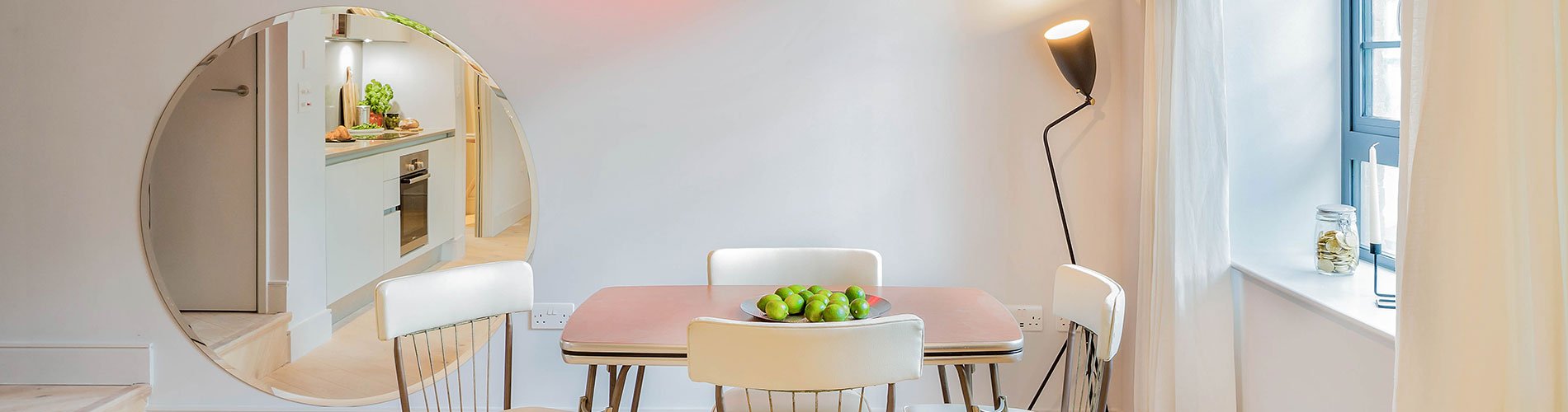 narrow view dining room Brentford flat conversion Gubi Grasshopper floor lamp vintage Lusty table reupholstered white leather