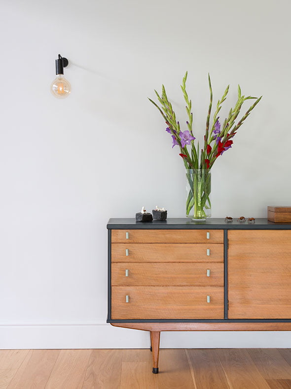 detached house by Oxford interior architects Element Studios vintage mid-century sideboard with Heals Junction wall light