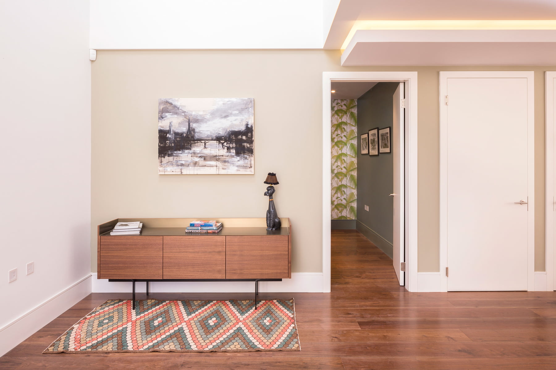 Mario Ruiz Stockholm sideboard in Fulham with Abigail Ahern poodle lamp and Lewis Scott painting Untitled London 10 over