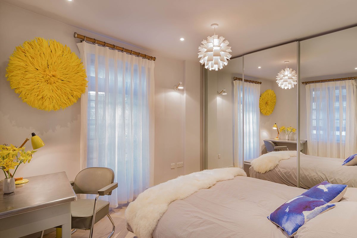 Normann Copehagen pendant in contemporary bedroom interior with 1950s vintage desk and chair and Loaf Jonah bed in dandelion