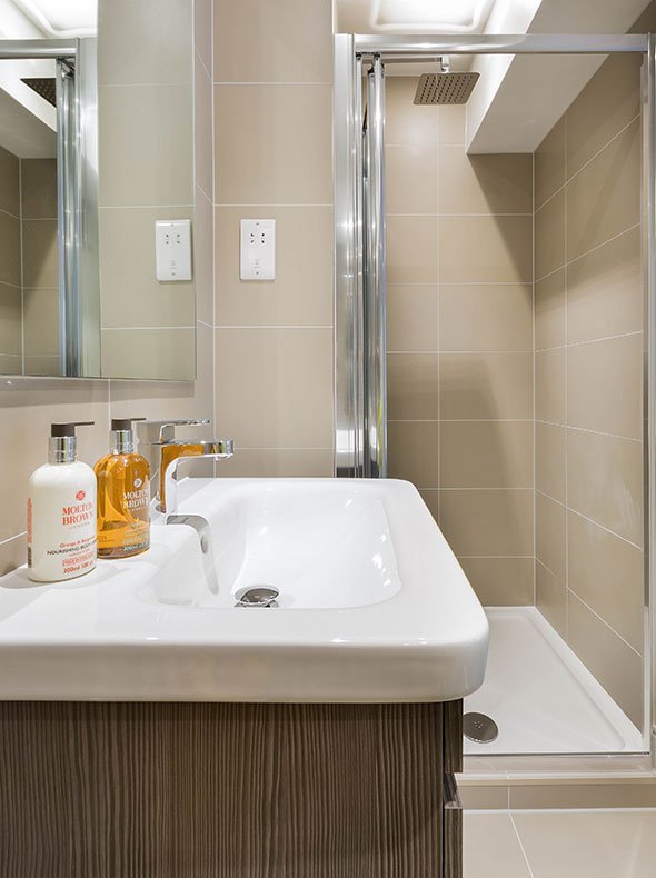 interior design by Element Studios of Verve Properties Brentford flat en-suite with Duravit wash basin and walnut vanity unit