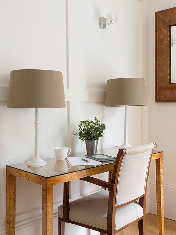 dining room interior with walnut console table and lamps with walnut mirror and painted panelling by Element Studios