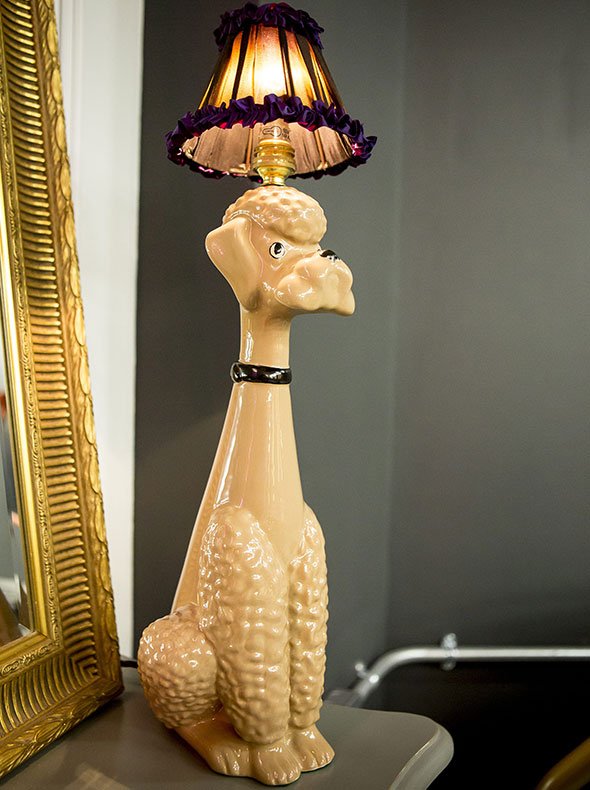 basement of George Northwood’s hair salon close-up with Abigail Ahern poodle lamp and vintage mirror Farrow & Ball Downpipe