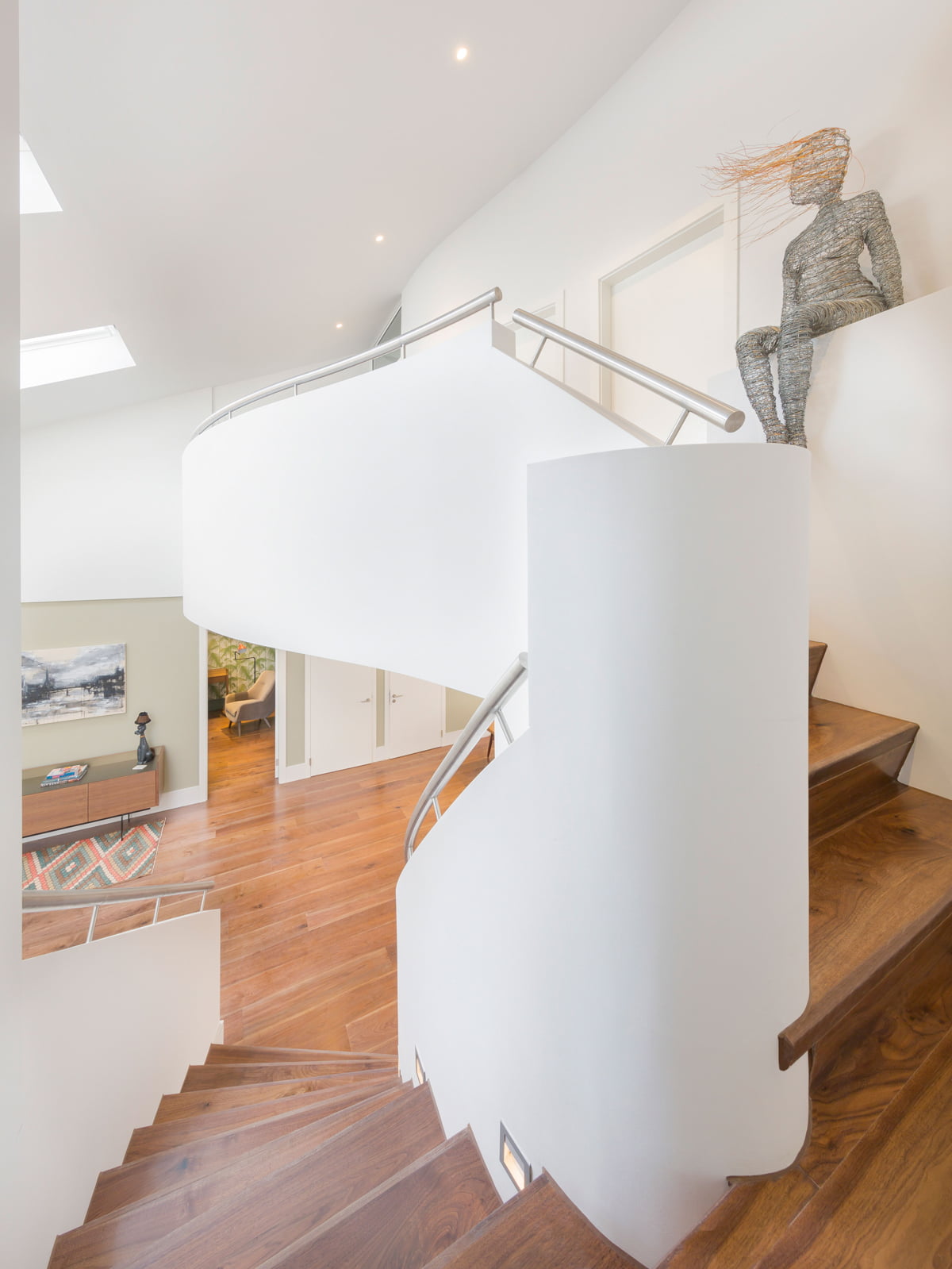 Interior Verve Properties Sunlight Mews staircase dark oak floorboards Gubi Grasshopper floor lamp
