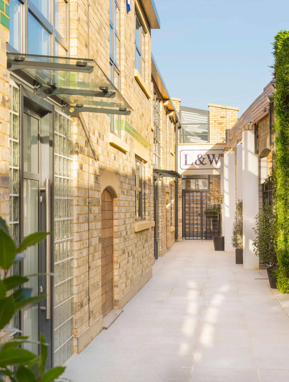 private walk way to exclusive luxury townhouses Sunlight Mews in Fulham by Element Studios